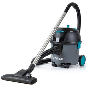 A Kenmore canister vacuum cleaner with a telescopic wand and wheeled base, designed for versatile cleaning tasks.