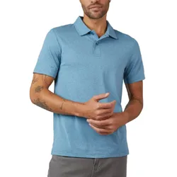 A man is wearing a light blue short-sleeve polo shirt paired with gray pants.