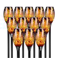 12-pack of solar-powered LED tiki torches featuring a black design with a flickering flame effect, ideal for outdoor lighting and ambiance.