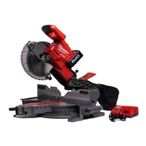 Cordless Milwaukee miter saw with a red and black design, equipped with a large circular blade, a charging kit, and a dust collection bag.
