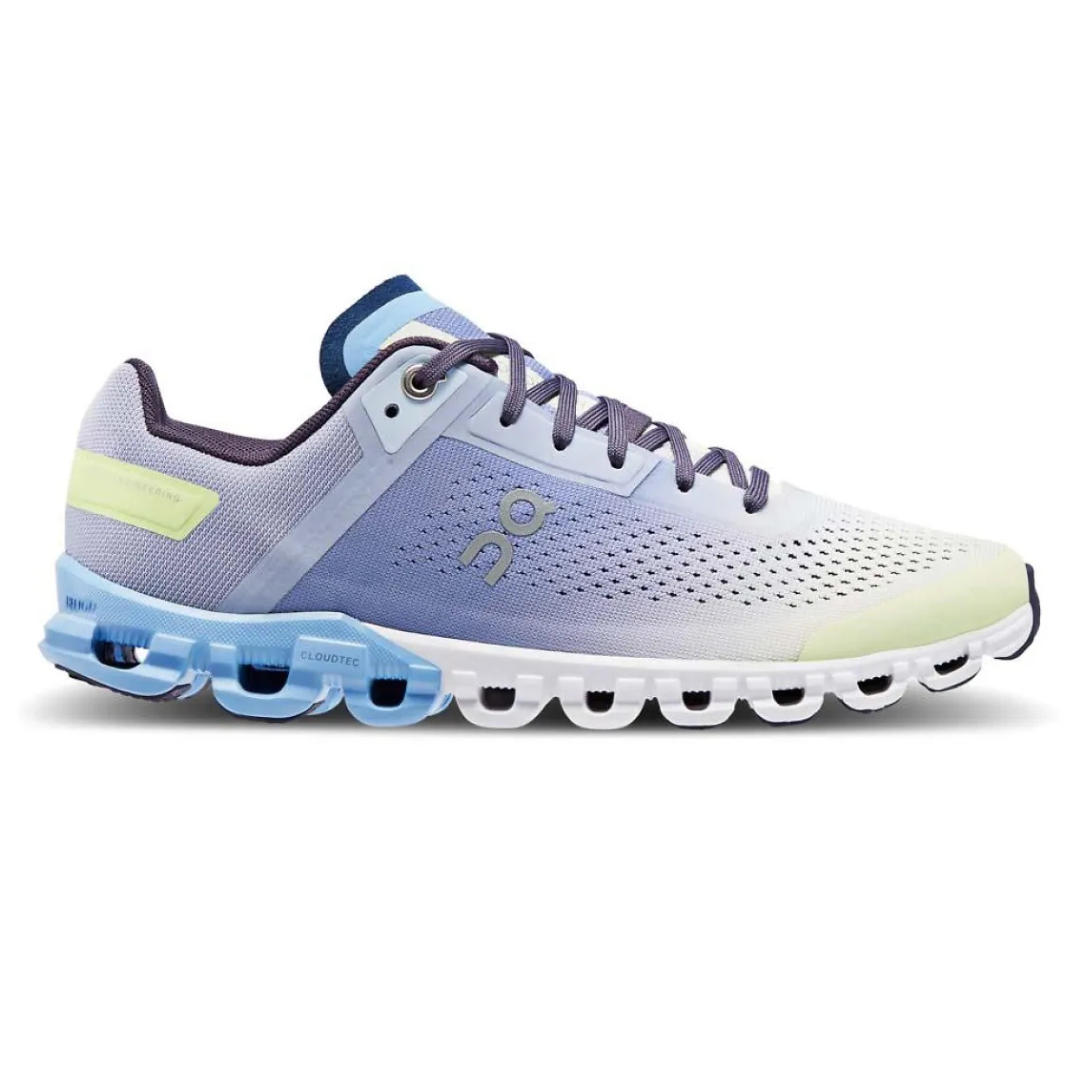 Athletic shoe by On, featuring a breathable mesh upper, CloudTec cushioning in light blue, and a lace-up closure for support.