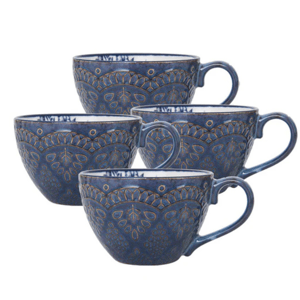 Set of four blue ceramic cups with intricate gold and blue patterns and rounded handles.