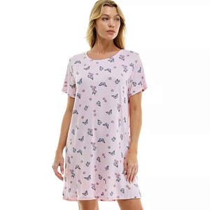 Light pink nightgown with short sleeves, featuring a butterfly pattern.