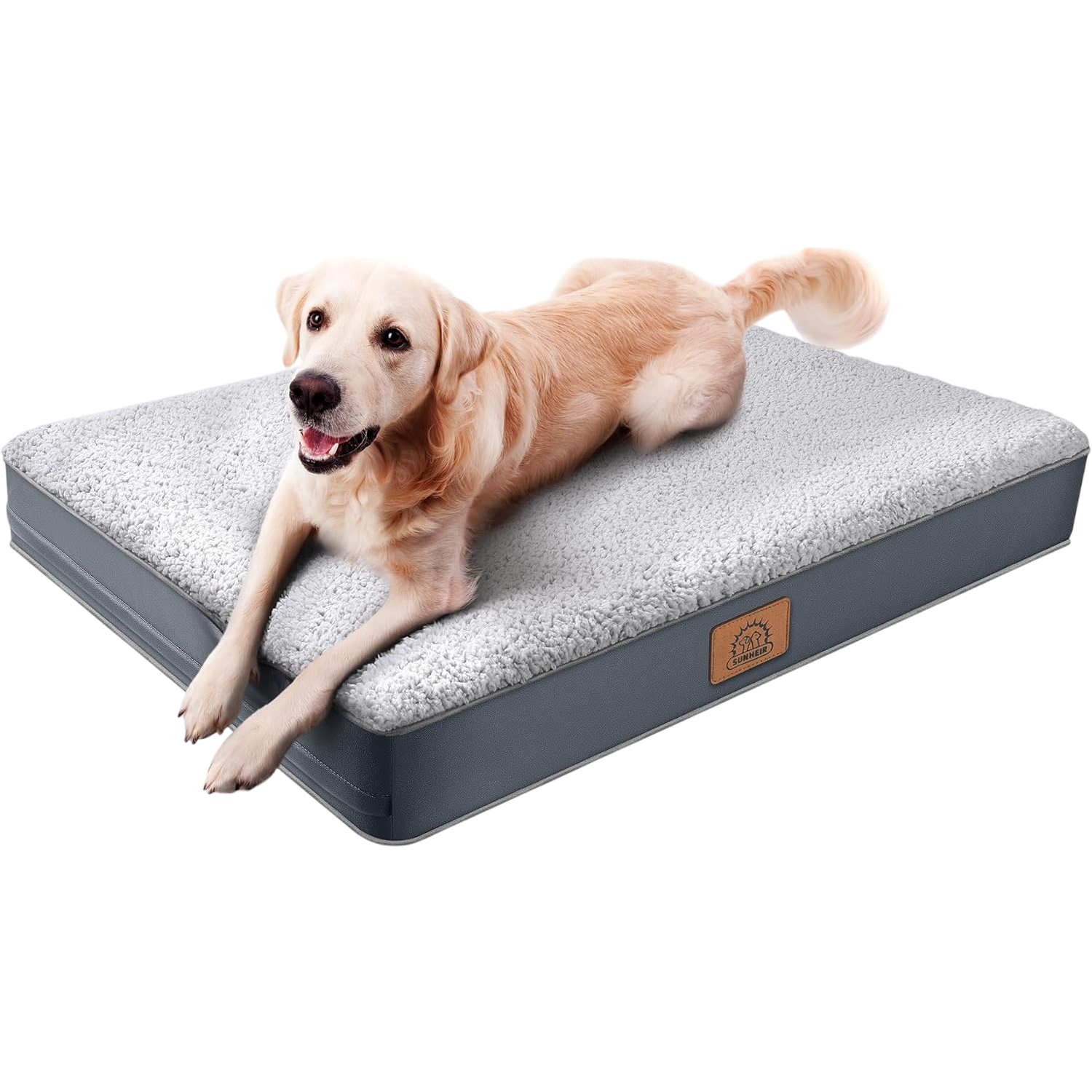 A golden retriever is lying on a gray orthopedic dog bed with a soft, plush top and a sturdy base. The bed features a logo patch labeled \“SUNHEIR.\“