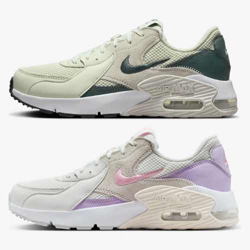 Two pairs of Nike Air Max 90 sneakers, one in a green and cream colorway, the other in white with pink and purple accents.