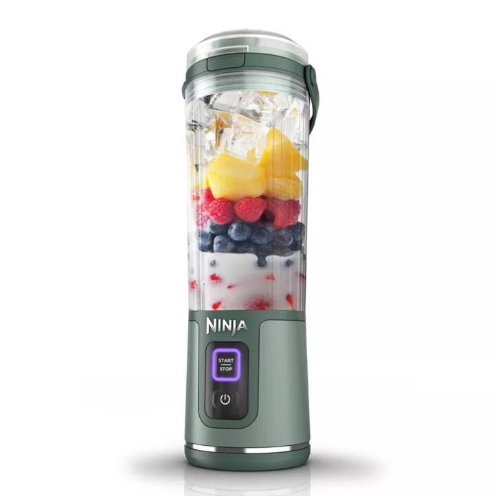 The Ninja Portable Blender is a compact, sleek blender featuring a transparent cup filled with ingredients like ice, mango, berries, and yogurt. It has a start/stop button and USB charging, suitable for on-the-go blending.