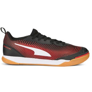 Puma Men's Ibero III Soccer Shoes feature a black and red textured upper with a white logo, black laces, and a gum sole, designed for indoor play.
