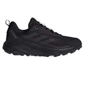 Black Adidas Terrex hiking shoe featuring a rugged design with subtle branding and a durable sole suitable for trail activities.