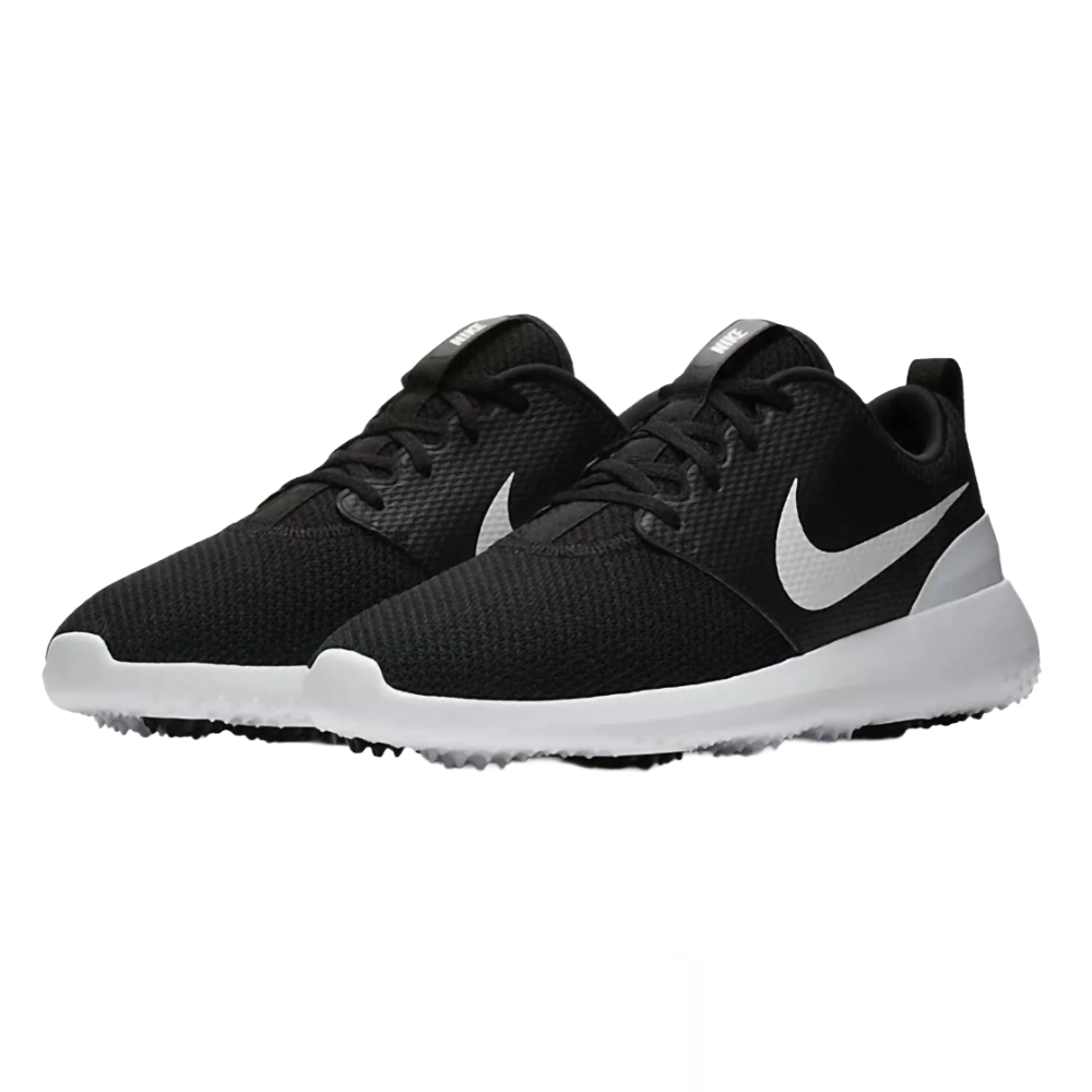 A pair of black and white athletic sneakers with a woven texture, featuring a prominent white swoosh logo on the side and a cushioned white sole.