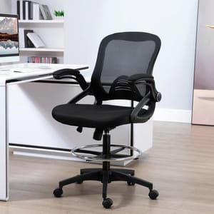 A black mesh ergonomic office chair with adjustable armrests, caster wheels, and a footring, positioned next to a white desk in a modern workspace.