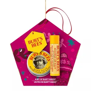 Burt's Bees Holiday Gift Set includes a beeswax lip balm and a tin of hand salve, packaged in a festive, pink, pentagon-shaped box.