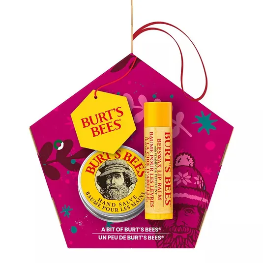 Burt's Bees Holiday Gift Set includes a beeswax lip balm and a tin of hand salve, packaged in a festive, pink, pentagon-shaped box.