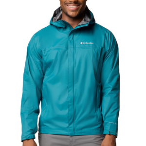 A person wearing a teal Columbia rain jacket with a hood, zip front, and brand logo on the chest.