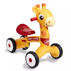 The Radio Flyer Giraffe Ride-On is a bright yellow and orange ride-on toy resembling a giraffe, with a red seat and handle, three wheels, and smooth-rolling tires designed for young children.
