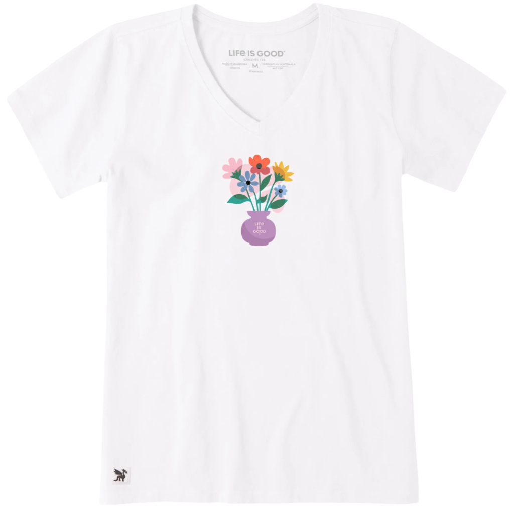 White V-neck T-shirt featuring a colorful flower vase graphic with the text \“Life is Good\“ inside the vase.