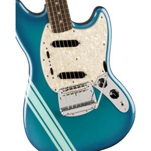 A blue electric guitar with a pearl pickguard, dual pickups, and a chrome tremolo bridge.