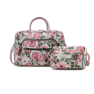 A set of two floral-patterned bags featuring pink and green peony designs; includes a large duffel with dual handles and a smaller crossbody bag with adjustable straps.
