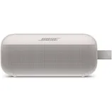 Bose portable Bluetooth speaker in a sleek, compact design with a fabric strap and perforated front for audio output, featuring the Bose logo on top.