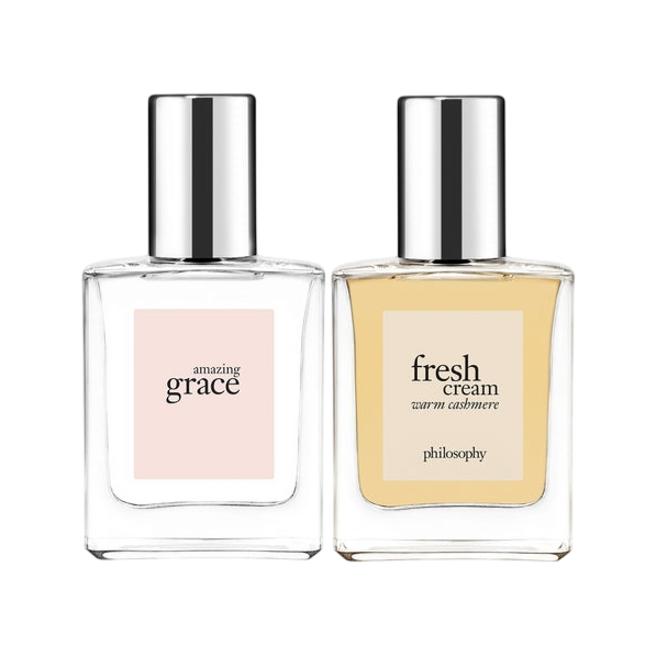 Two perfume bottles are displayed: one labeled \“Amazing Grace\“ and the other \“Fresh Cream Warm Cashmere,\“ both from Philosophy.