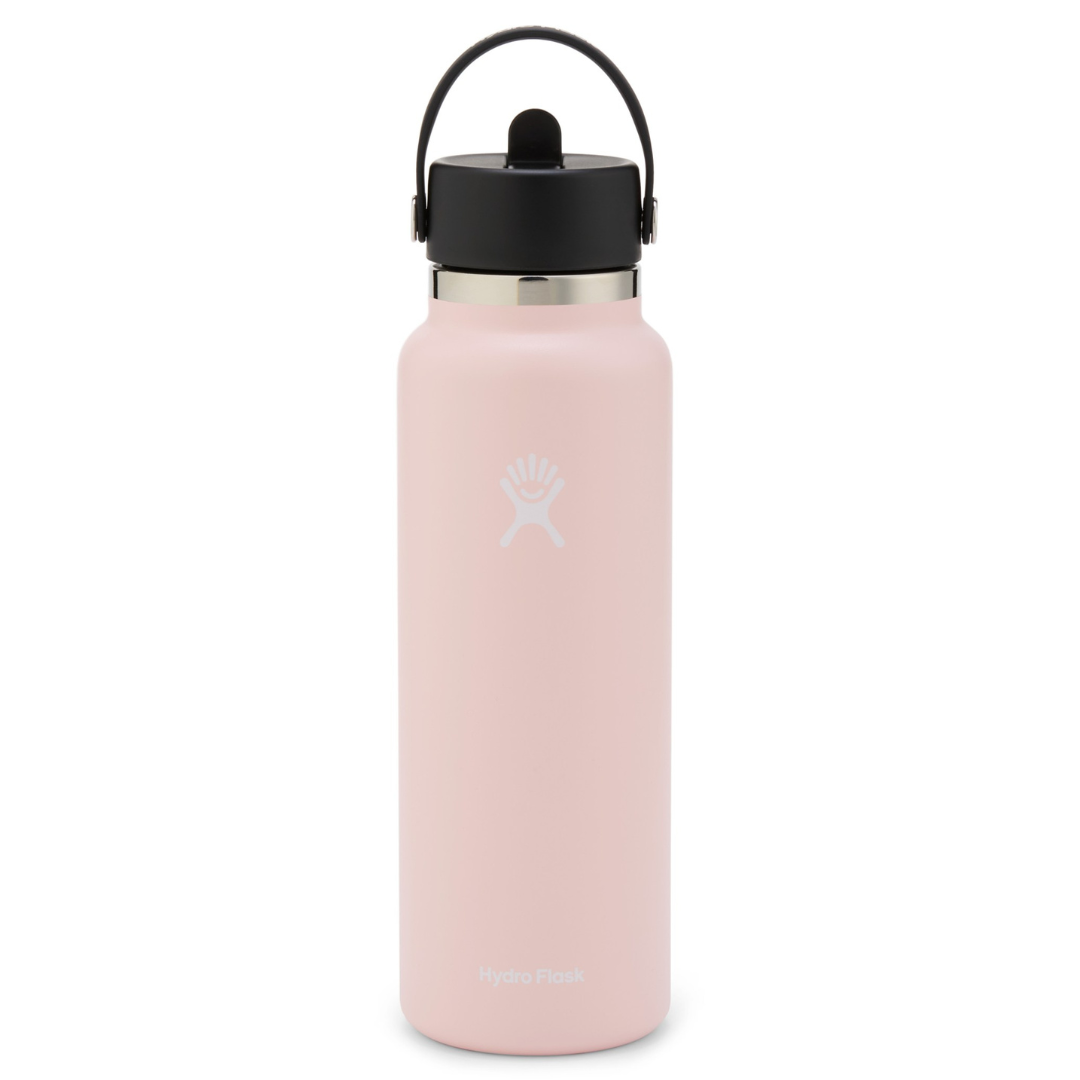 A pink Hydro Flask water bottle with a black lid and handle, featuring the brand's logo.