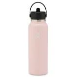 A pink Hydro Flask water bottle with a black lid and handle, featuring the brand's logo.