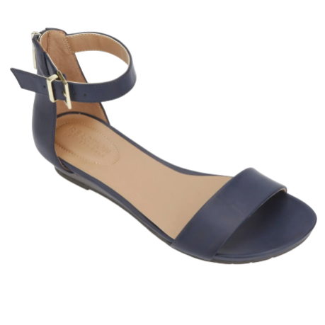 Dark blue flat sandal featuring an open toe, ankle strap with buckle, and tan insole.