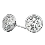 A pair of round bezel-set stud earrings featuring sparkling clear gemstones set in a silver-colored metal.