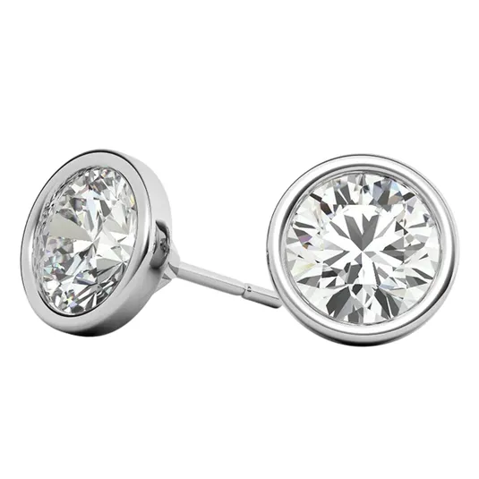 A pair of round bezel-set stud earrings featuring sparkling clear gemstones set in a silver-colored metal.