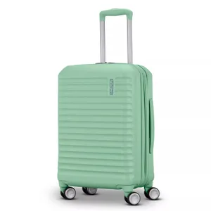 Mint green hard-shell suitcase with four spinner wheels, a telescopic handle, and horizontal ridged design for durability and style.