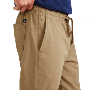 Dockers Pull-On Khakis are tan casual pants featuring an elastic waistband with a drawstring, side pockets, and durable stitching for comfort and functionality.