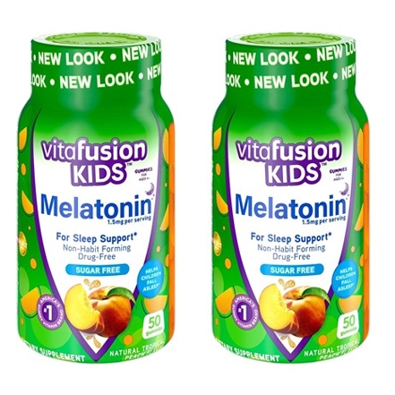 Two bottles of Vitafusion Kids Melatonin gummies for sleep support, sugar-free, with a natural tropical flavor.