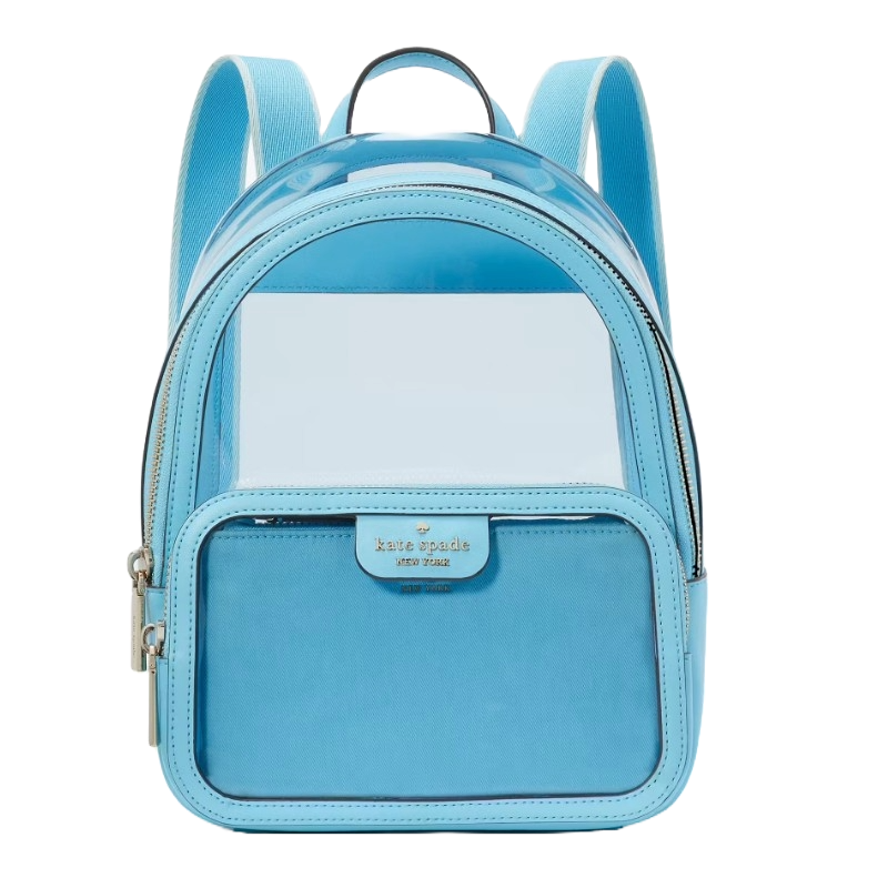 A light blue Kate Spade backpack featuring a transparent top section and a front zip pocket with the brand's logo.
