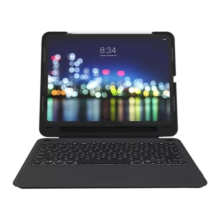 A tablet with a detachable keyboard case, displaying a blurry cityscape on the screen, often used for enhanced productivity and protection.