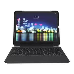 A tablet with a detachable keyboard case, displaying a blurry cityscape on the screen, often used for enhanced productivity and protection.
