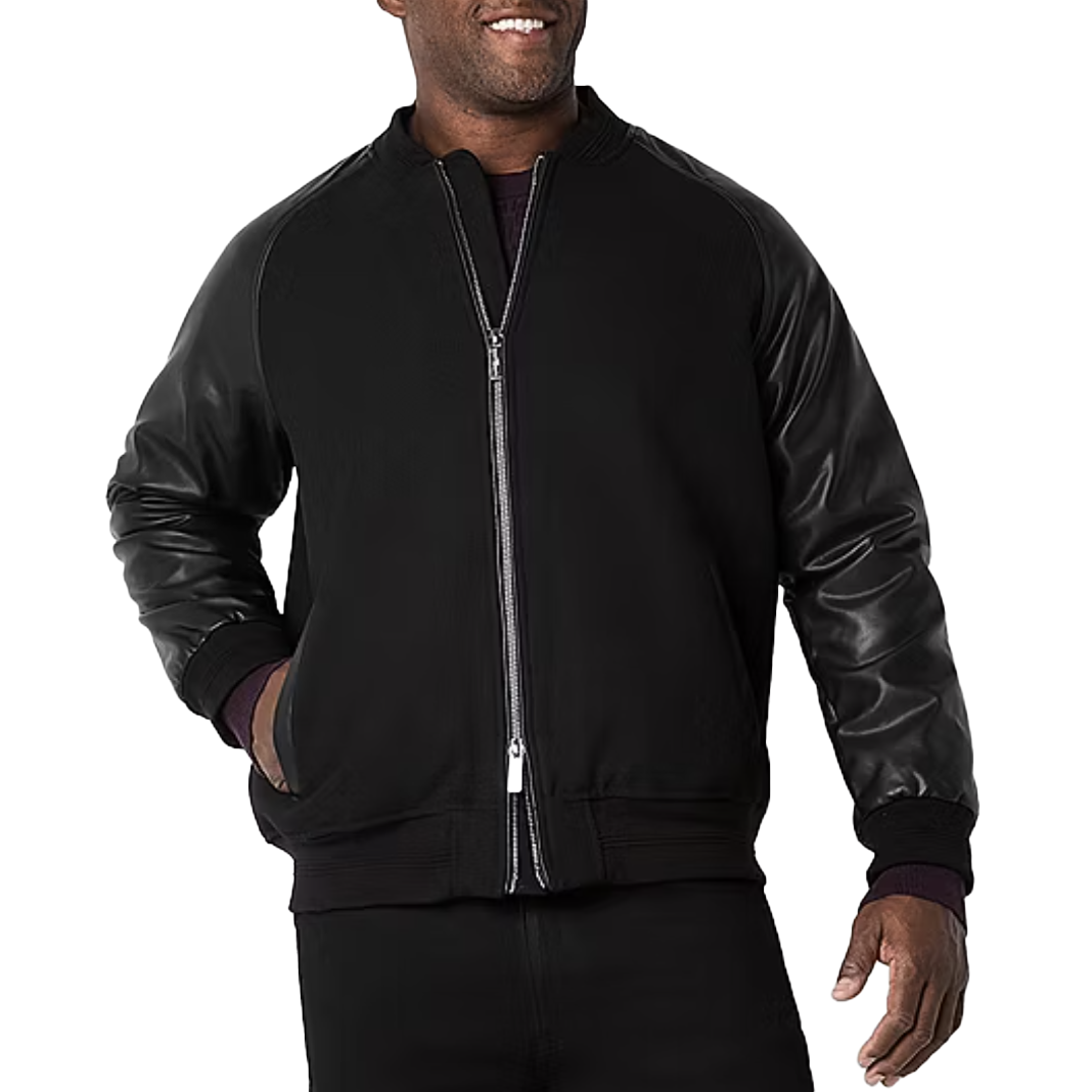 A black varsity jacket featuring a zip closure, with leather sleeves and ribbed cuffs.