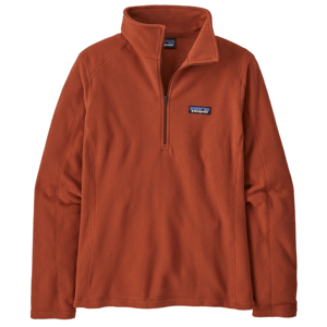A rust-colored Patagonia Micro D Pullover with a half-zip design, featuring long sleeves and a standing collar. The Patagonia logo is visible on the chest.