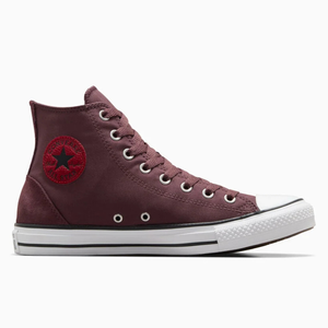 Maroon Converse Chuck Taylor All Star high-top sneaker with a white rubber toe cap and sole, featuring a red circular logo patch with a star on the ankle.