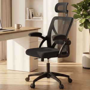 VASAGLE office chair with mesh design and adjustable armrests is placed by a wooden desk featuring a laptop and a lamp, set in a modern office space with light curtains and a potted plant.