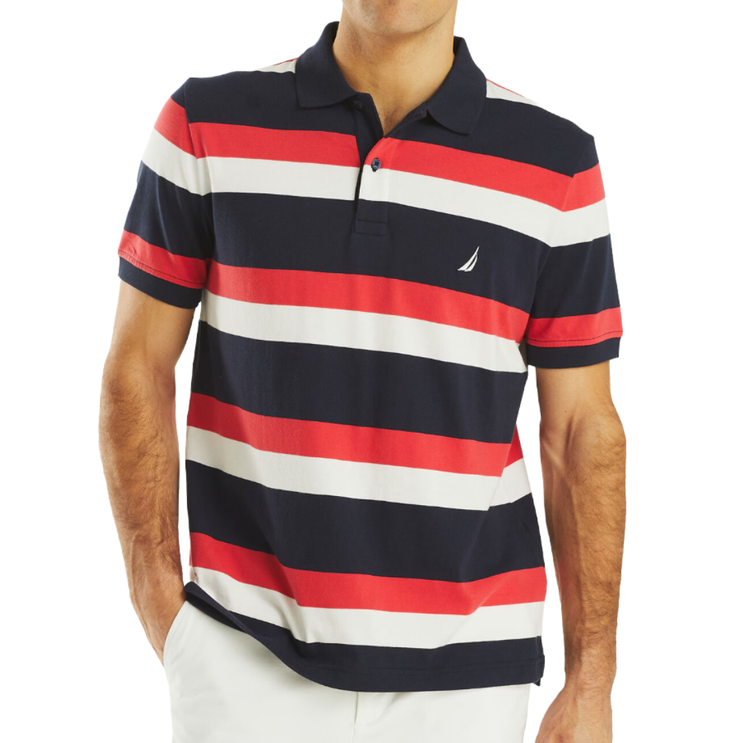 A men's polo shirt with horizontal stripes in navy, red, and white, featuring a small sailboat logo. The model pairs it with white pants.