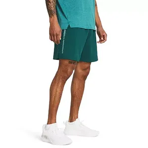 Green shorts with a logo on the right leg, above the hem, paired with a teal top and white sneakers.