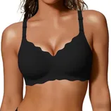 A black, seamless bra with scalloped edges and adjustable straps, designed for comfort and support.