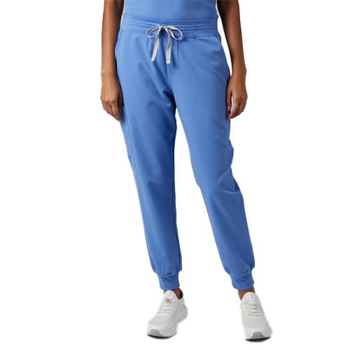 Blue jogger pants with an adjustable drawstring waistband and elastic cuffs, paired with white sneakers.