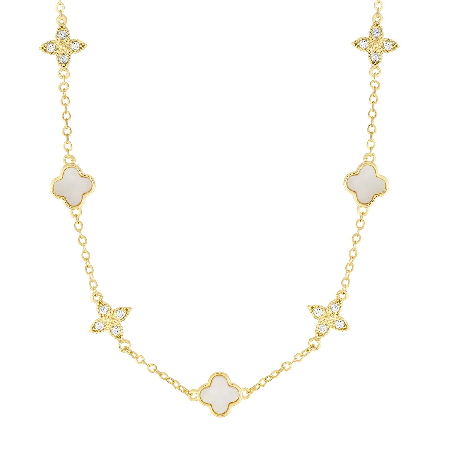 The Adornia Clover Station Necklace features gold chain links interspersed with white mother-of-pearl clover shapes and diamond-like accents in a floral motif. The design blends elegance and simplicity with a luxurious touch.