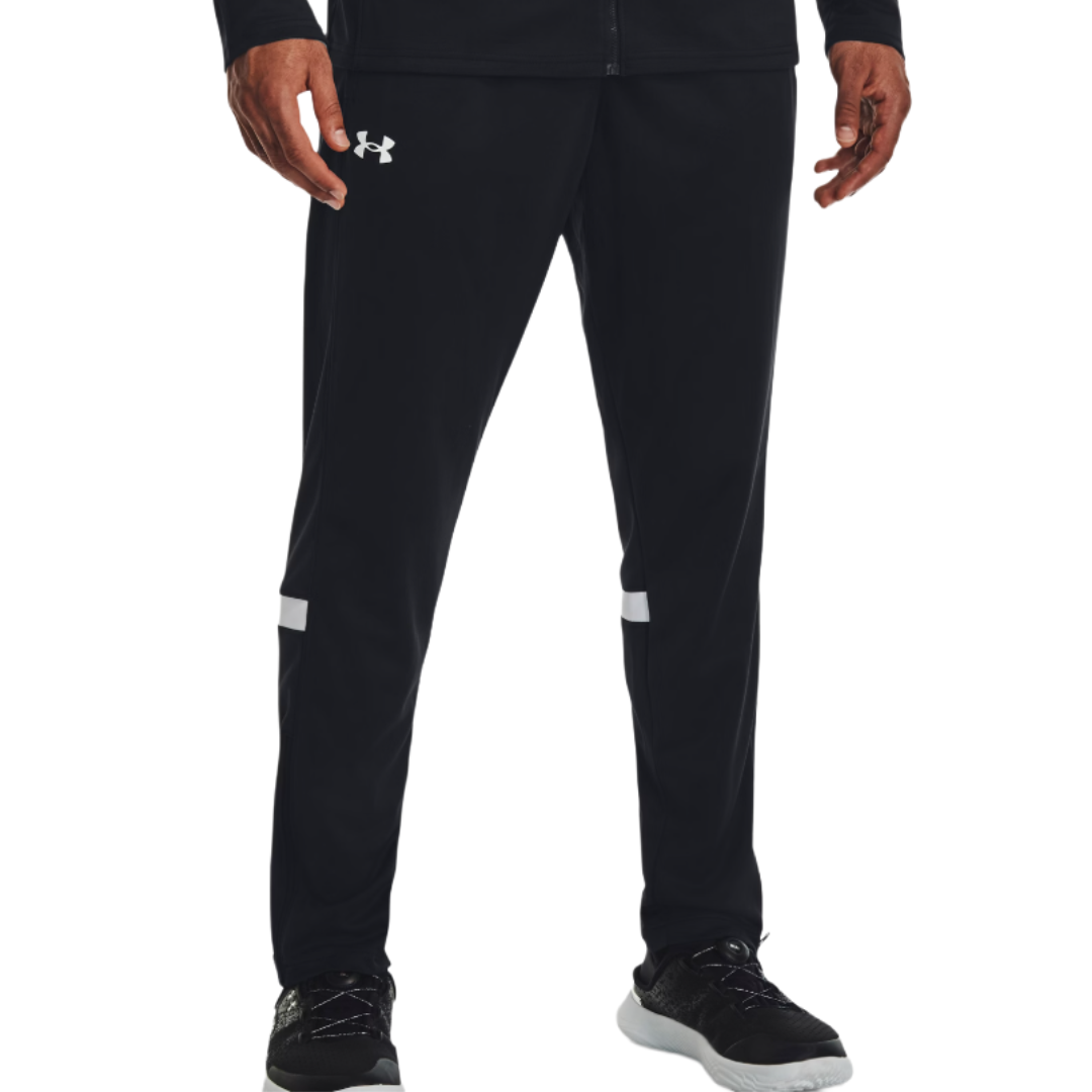 Black athletic track pants with the Under Armour logo on the upper left thigh, featuring white stripes above the knees, paired with black athletic shoes with white soles.