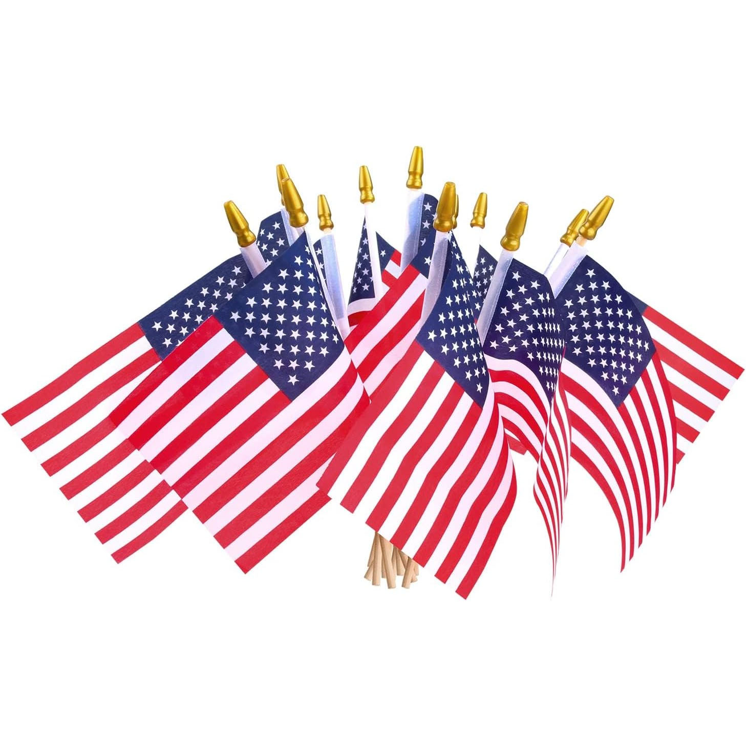 Several small American flags with gold spear tops are grouped together.