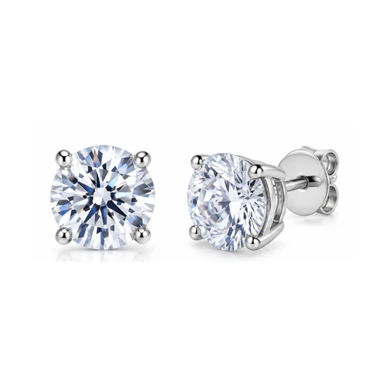 A pair of round diamond stud earrings set in a four-prong white metal setting, with a classic post and butterfly back design.