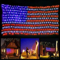 A set of LED lights arranged to mimic the design of the American flag, displayed on a house and garden setting at night.