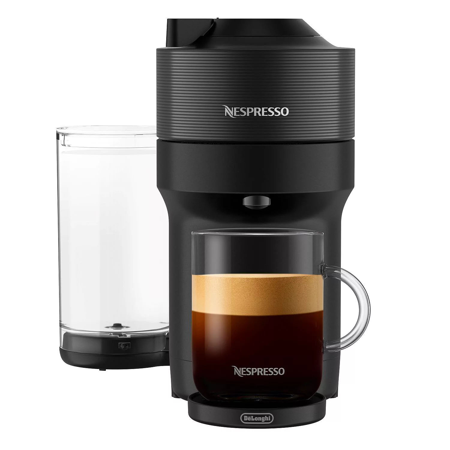 A sleek black Nespresso coffee machine with a clear water reservoir and a transparent glass cup filled with espresso on the drip tray, featuring the Nespresso and DeLonghi logos.