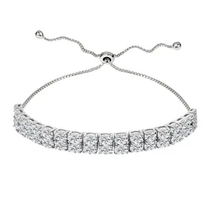 A silver adjustable bracelet featuring two rows of sparkling round-cut stones, secured with a sliding clasp for a customized fit.