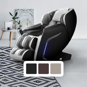 A black and silver massage chair in a modern living room setting with a patterned rug and minimalistic decor.